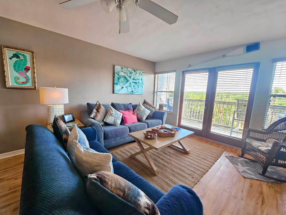 Spacious Living Room with Bright Open Windows