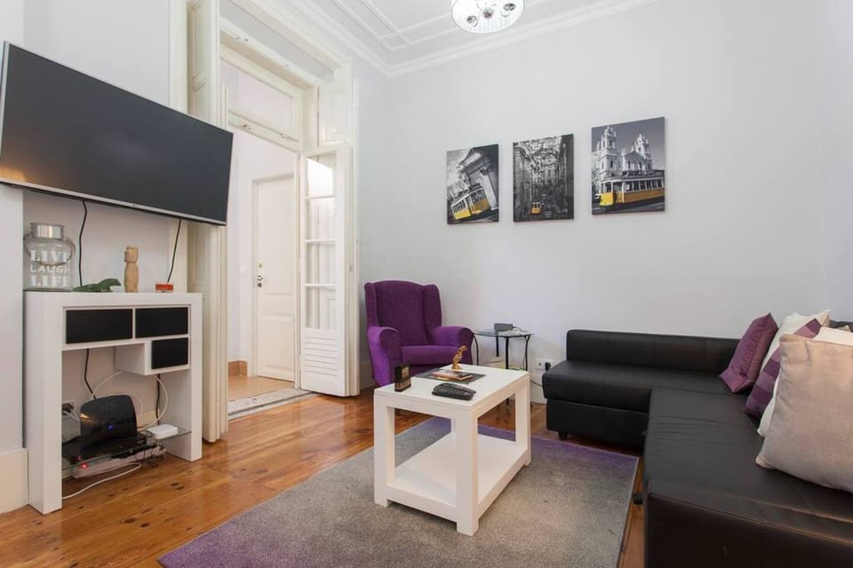 Living Room: Stylish space with modern decor, perfect for relaxation after city adventures!