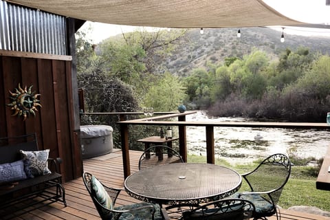 You will notice an inflatable hot tub on the deck that has since been replaced with a Sundance Spa as seen in the 3rd picture.