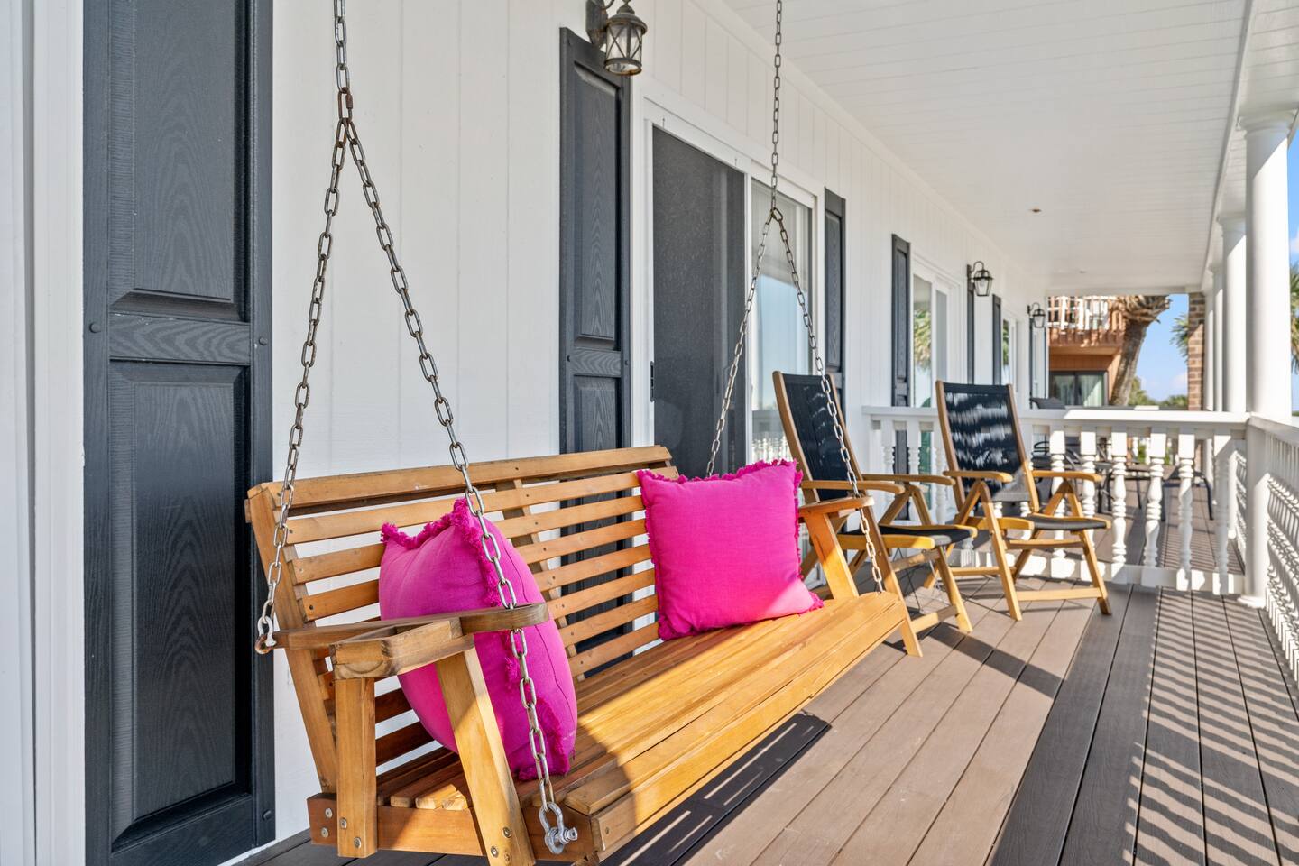 Cozy swing where you can relax and enjoy the ocean breeze.