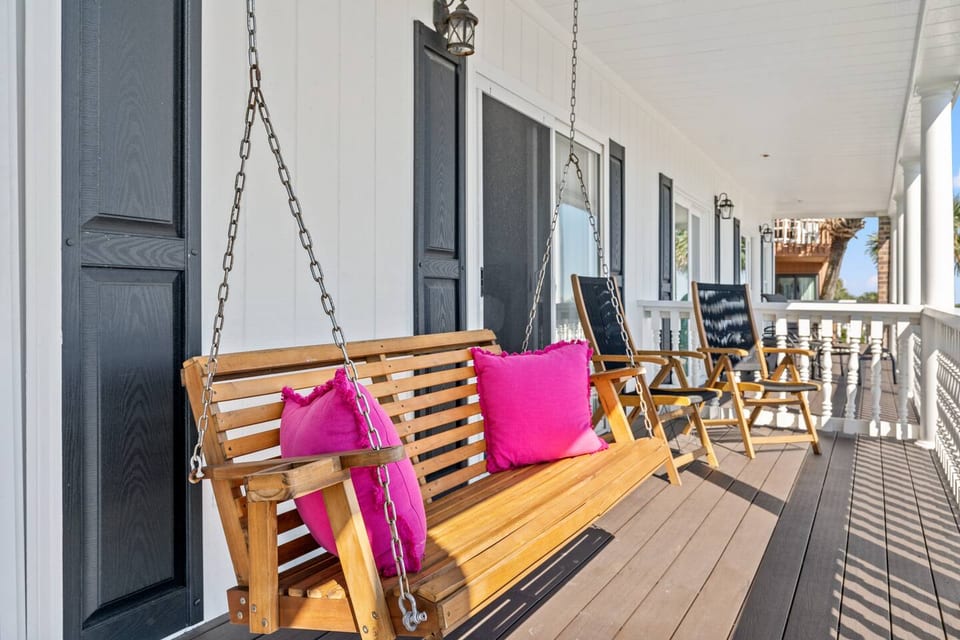 Cozy swing where you can relax and enjoy the ocean breeze.