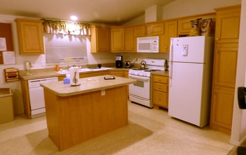 Clean modern kitchen stocked with organic condiments and Cash Pantry