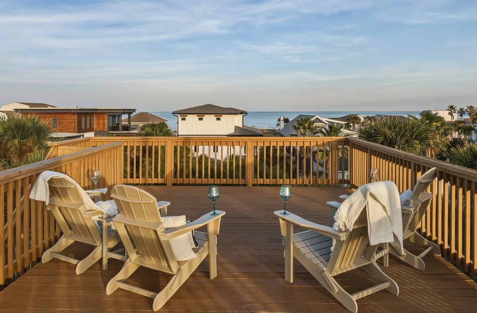 Rooftop seating with water views — close enough to the beach to feel the breeze, far enough to enjoy your privacy