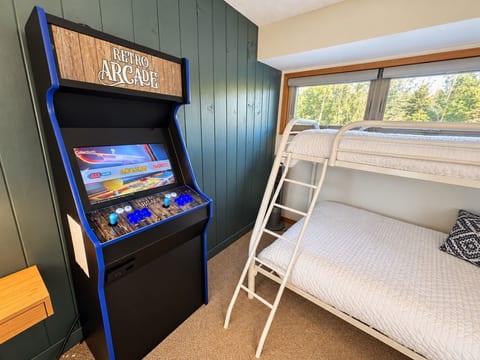 Arcade in the loft for rainy day entertainment