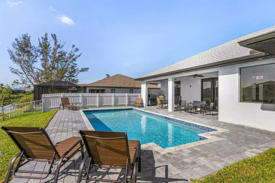 Enjoy a south-facing heated saltwater pool for your relaxation.