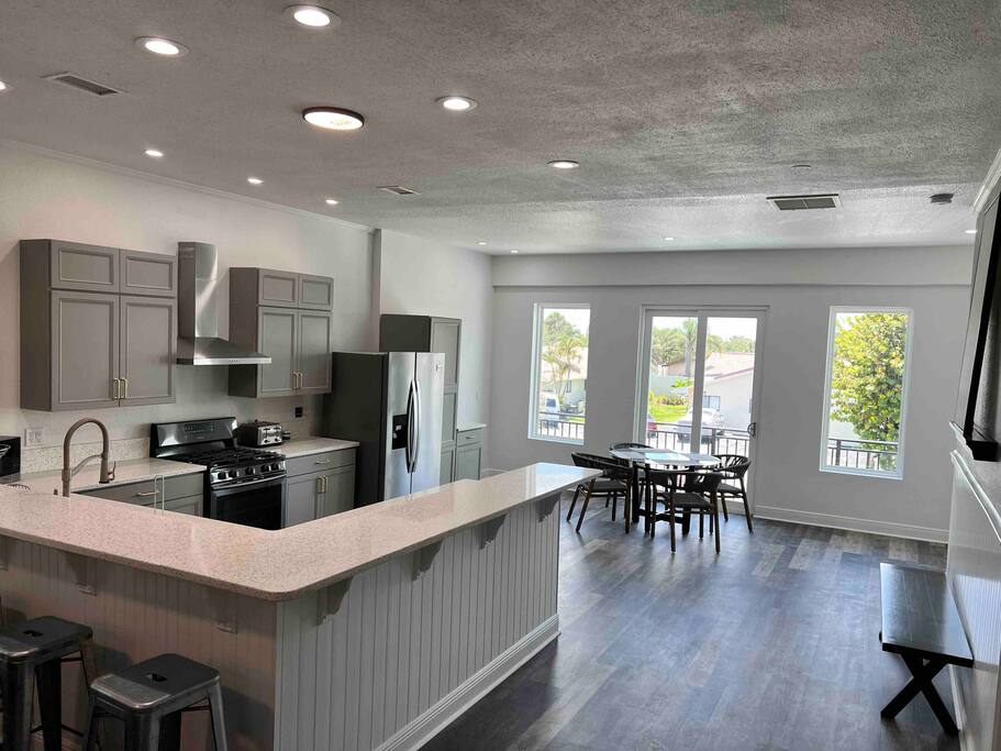 Welcome to our executive kitchen in Cocoa Beach! This modern, fully equipped space is perfect for gourmet cooking and entertaining. Indulge in sleek appliances, ample counter space, and a chic dining area - 4,000 sqft. 6bdrm Oceanview with Game Rm. Htd Pool - Oceanfront