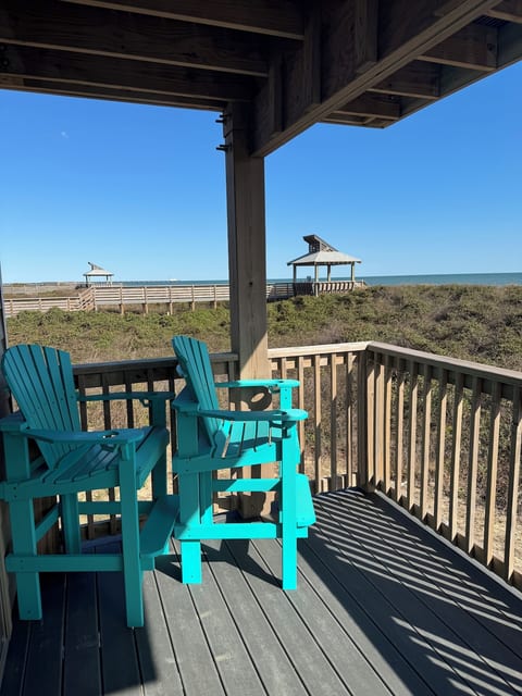 balcony view of beach access with gazebo