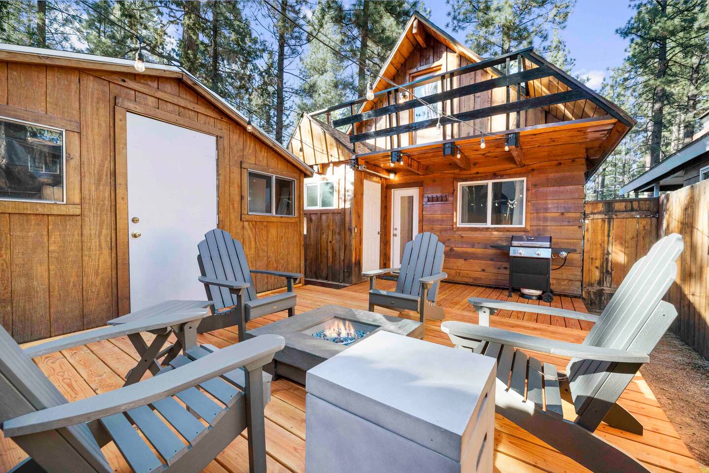 Enjoy your cozy fire pit and seating for all under the string lights and stars of Big Bear!