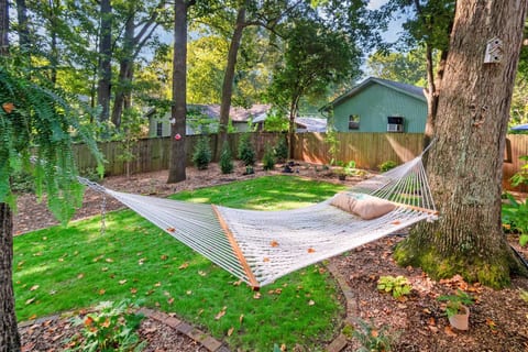 Kick back in the hammock strung between towering trees - the perfect spot for an afternoon nap or peaceful reading session
