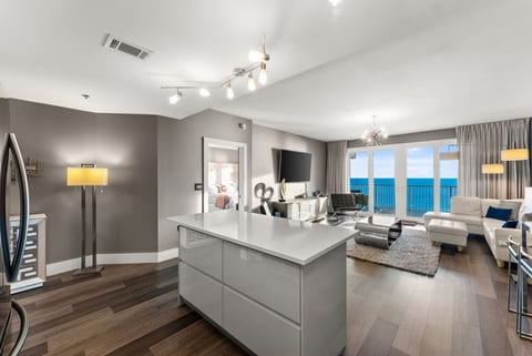 Open living space with chic décor, perfect for relaxing after a day at the beach.
