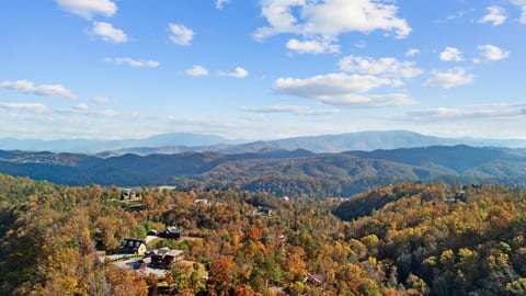 Experience the magic of the fall in the Smoky Mountains, where vibrant autumn colors stretch across the rolling hills and breathtaking mountain views create the perfect backdrop for your getaway.