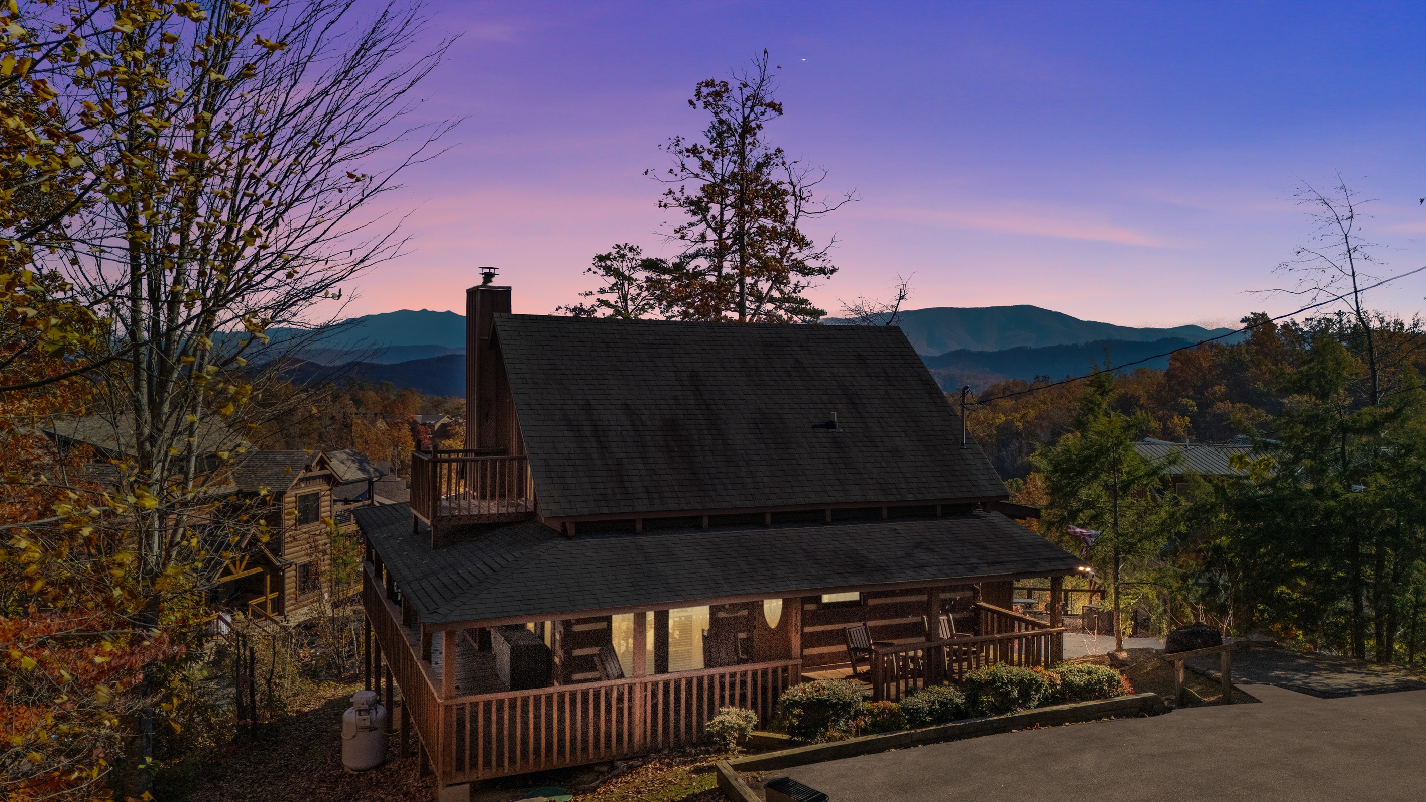 Unwind in rustic comfort — where warm wood tones, cozy textures, and Smoky Mountain charm create the perfect mountain retreat.