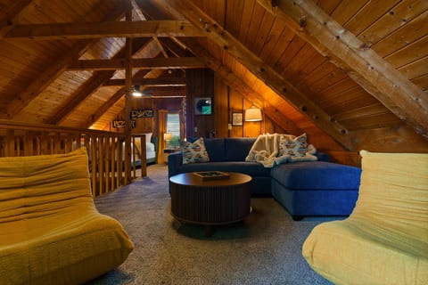 Curl up in the loft lounge with a movie or a game — extra space to spread out and relax at Dancing Embers.