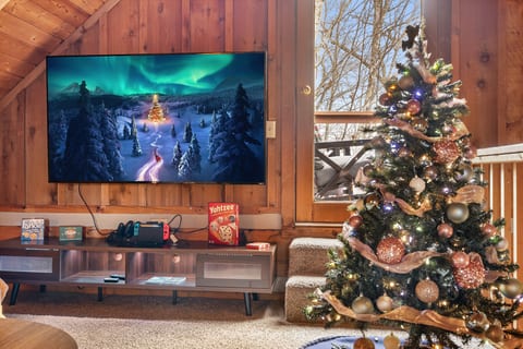 Holiday movie nights are even better in the mountains! Settle into our loft entertainment area for Christmas classics, games, and quality time together.