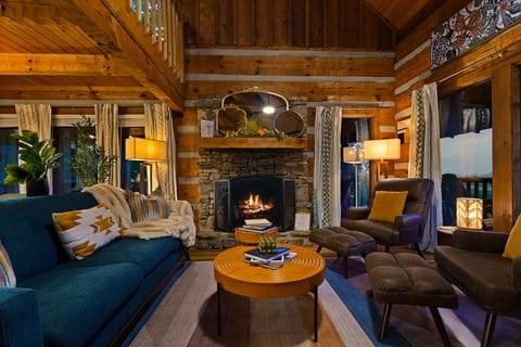 Clean design, a crackling fire, and plush seating — the living room at Dancing Embers is where mountain memories are made.