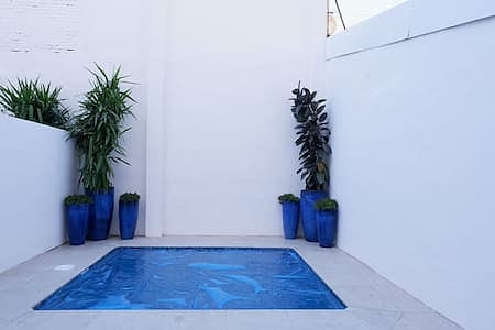 Sleek apartment with private pool