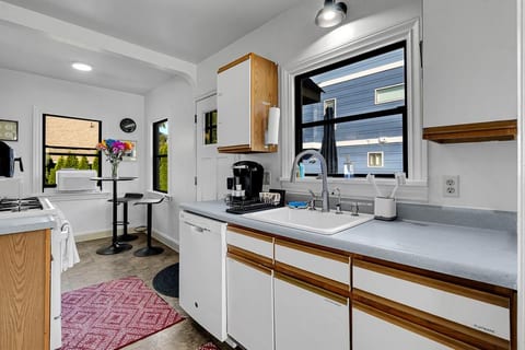 Fully outfitted kitchen. I do not think you will find it lacking. If Keurig Isn't your style there is a Krups drip coffee machine under the counter.