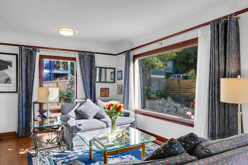 This living room has great light all day long. Don't get too comfortable though, you just might take a nap!