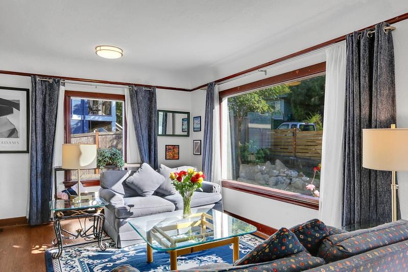This living room has great light all day long. Don't get too comfortable though, you just might take a nap!