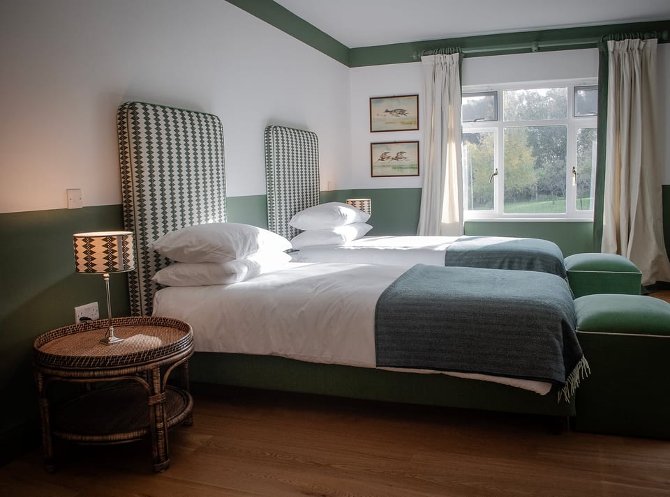 Deluxe Zweibettzimmer mit Gartenblick