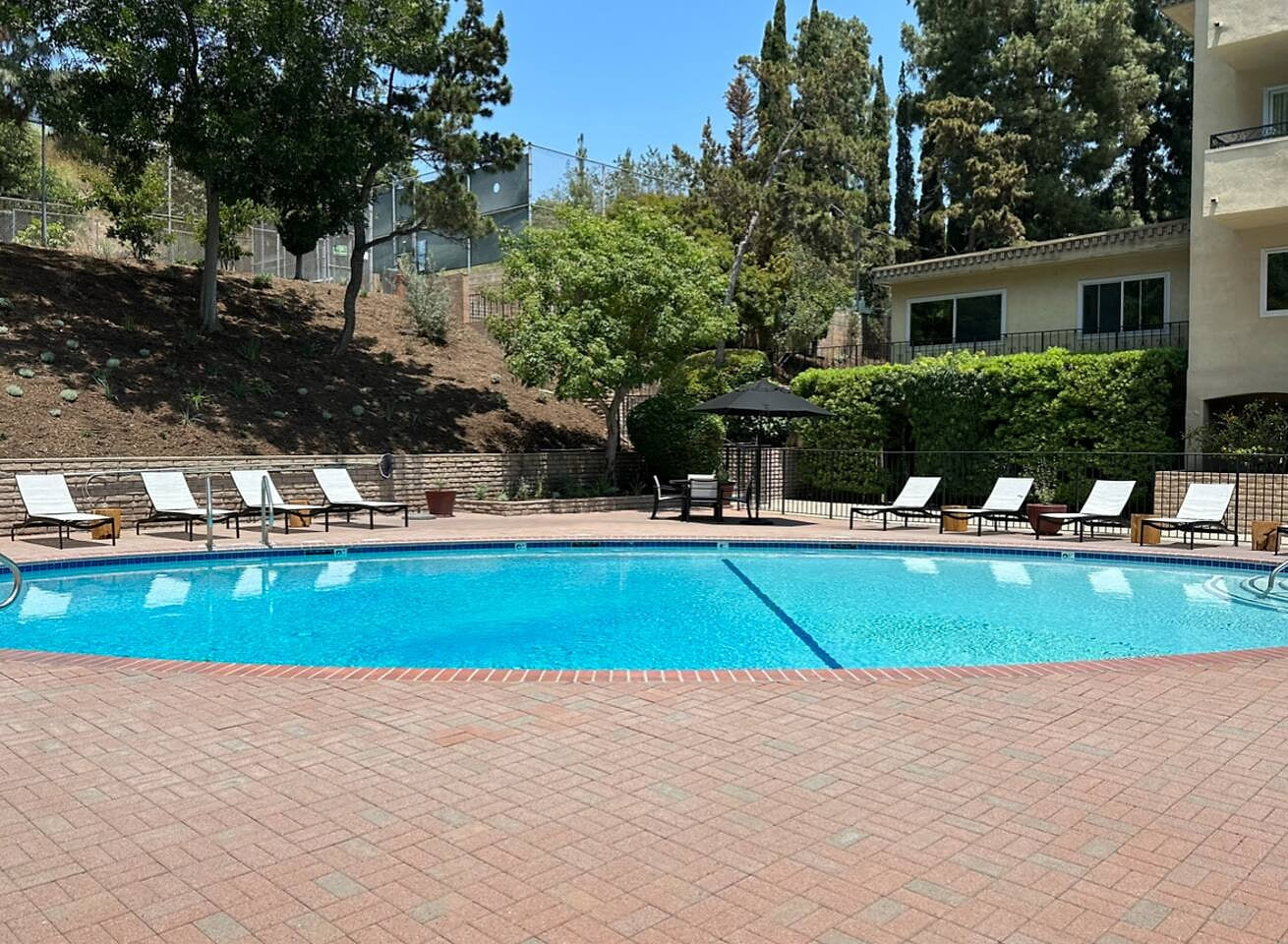 Take a dip in the refreshing pool, perfect for cooling off or lounging in the sun. Whether you're swimming a few laps or relaxing poolside, it's the ideal spot to enjoy the outdoors and make the most of your stay.