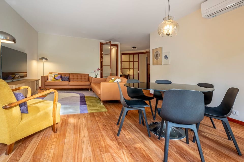 Living Room: Stylish blend of comfort and design with ample space for dining and lounging!