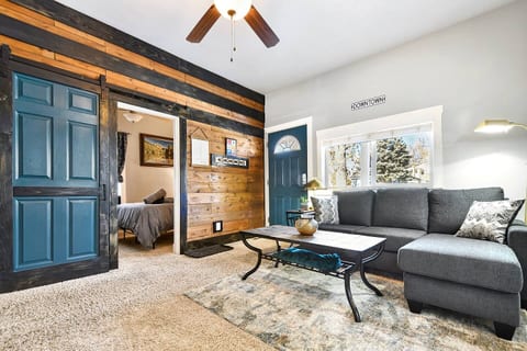 Where rustic charm meets modern ease: this cozy lounge invites you to settle in and stay awhile.