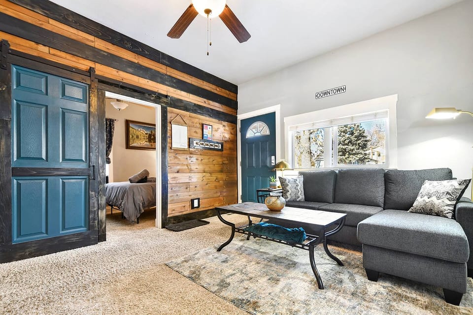 Where rustic charm meets modern ease: this cozy lounge invites you to settle in and stay awhile.