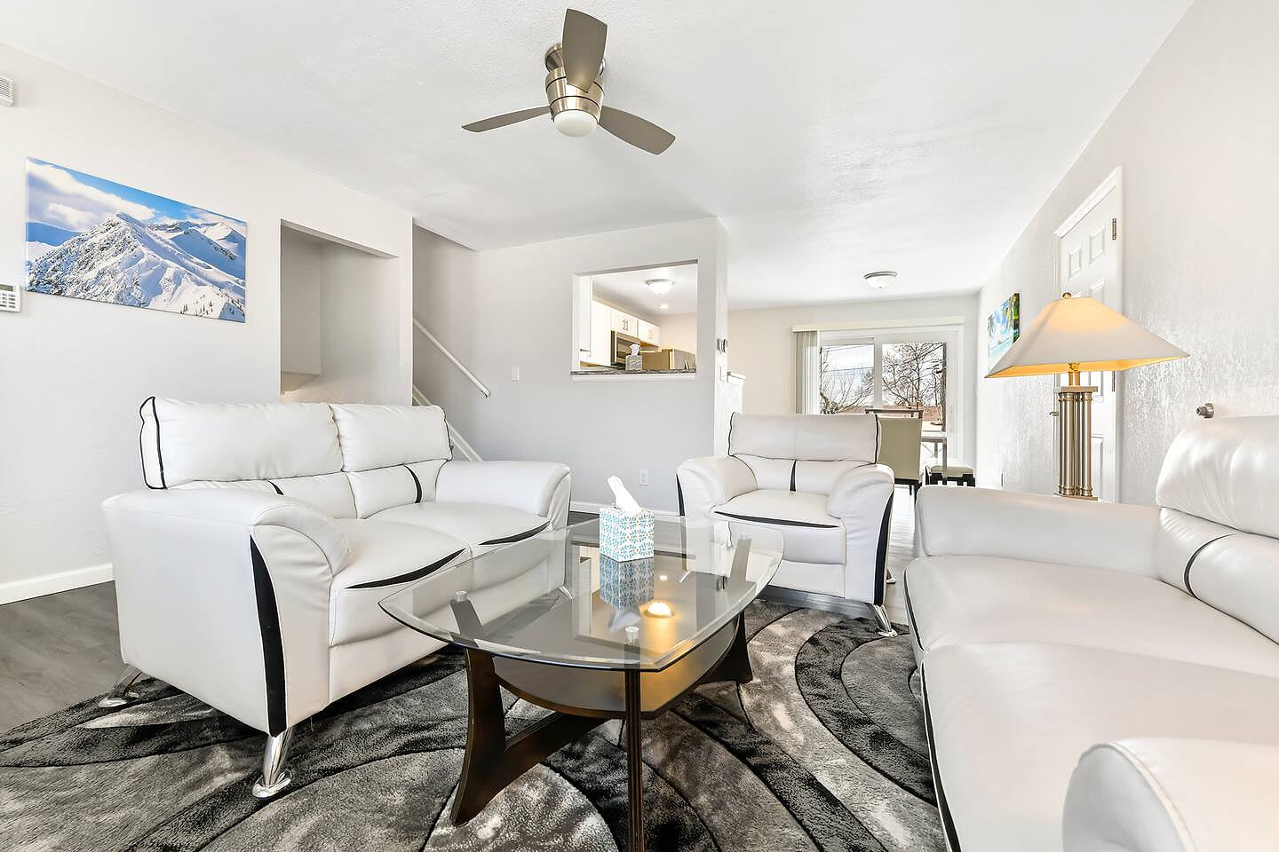 Gather, relax, and reconnect in this luminous living space where comfort meets effortless flow and warmth.