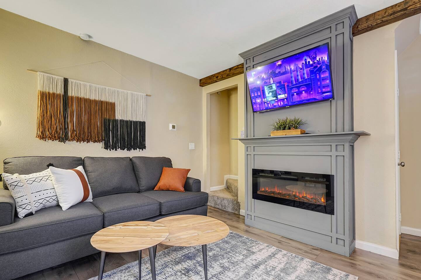 A glowing hearth and soft seating, your front-row seat to comfort and calm.