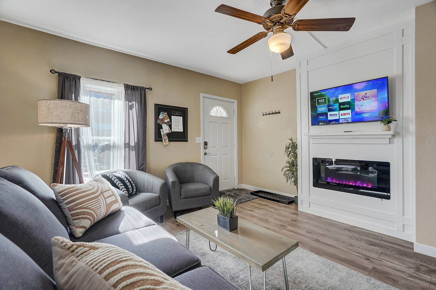 Evenings glow here. Fireplace flickering, your favorite show on, and comfort within arm's reach.