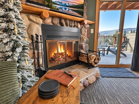 Wood burning fireplace with Moose Mountain views