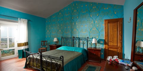 The majestic master bedroom of farmhouse 1