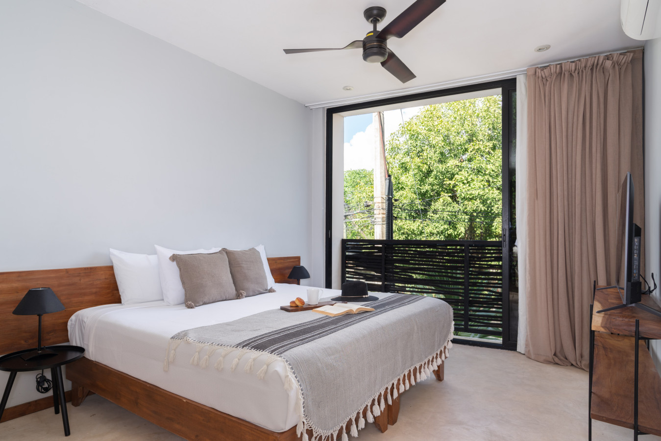 This cozy room features a soft king bed, a spacious window that brings in plenty of sunlight, and reliable AC for perfect comfort. A bright and refreshing environment ideal for unwinding.