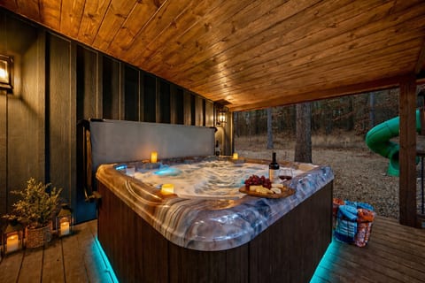 Private covered hot tub — perfect for relaxing day or night