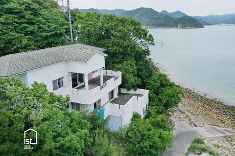 is villa 06: Private Beachfront, Sleeps 16 image 1