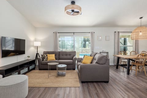 Living Area with smart TV and pool access