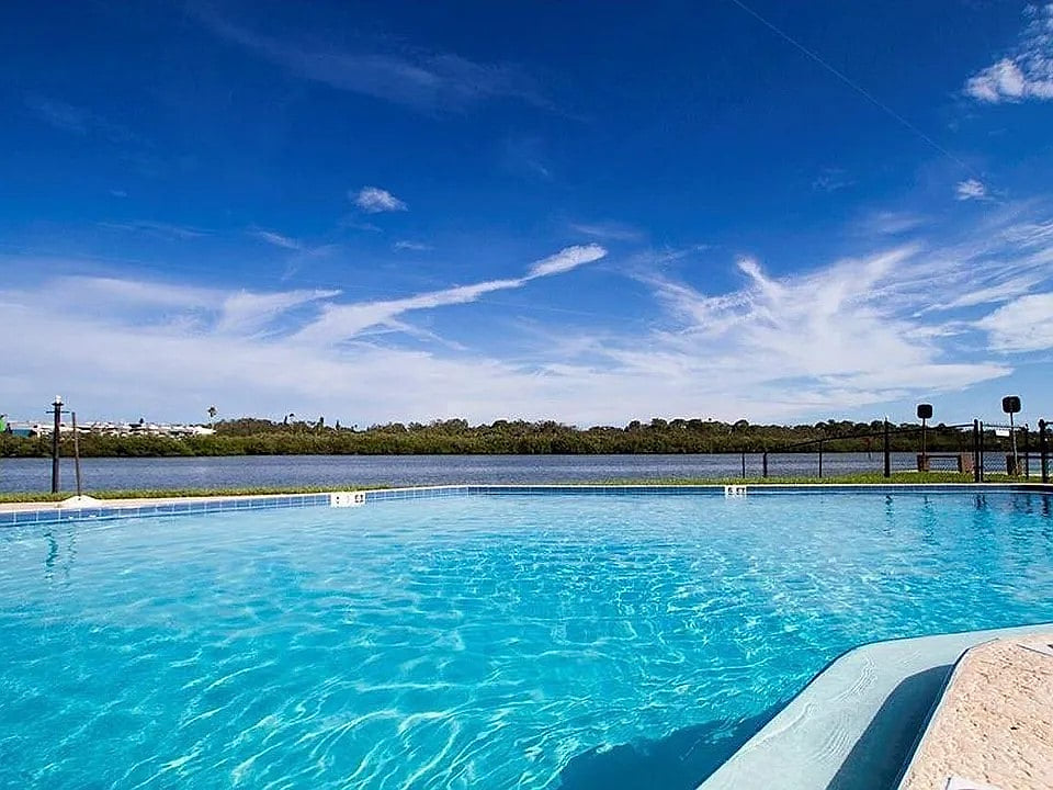 Beautiful Waterfront Condo short walk to the beach image 1