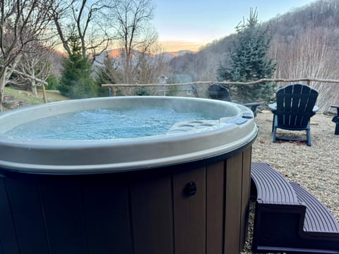 The hot tub is a great place to spend some time any time of day or night--just steps from the front porch.