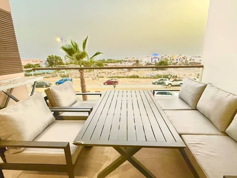 Sunny Beachside Apartment with Pool and Parking