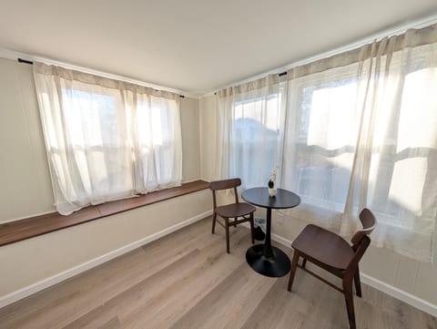 Enjoy your morning coffee or a book out in the sunroom, surrounded by natural light