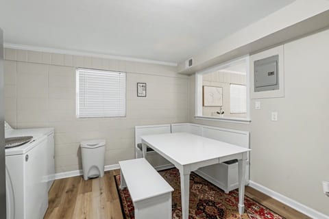 Bright dining nook with built-in bench seating and clean modern finishes