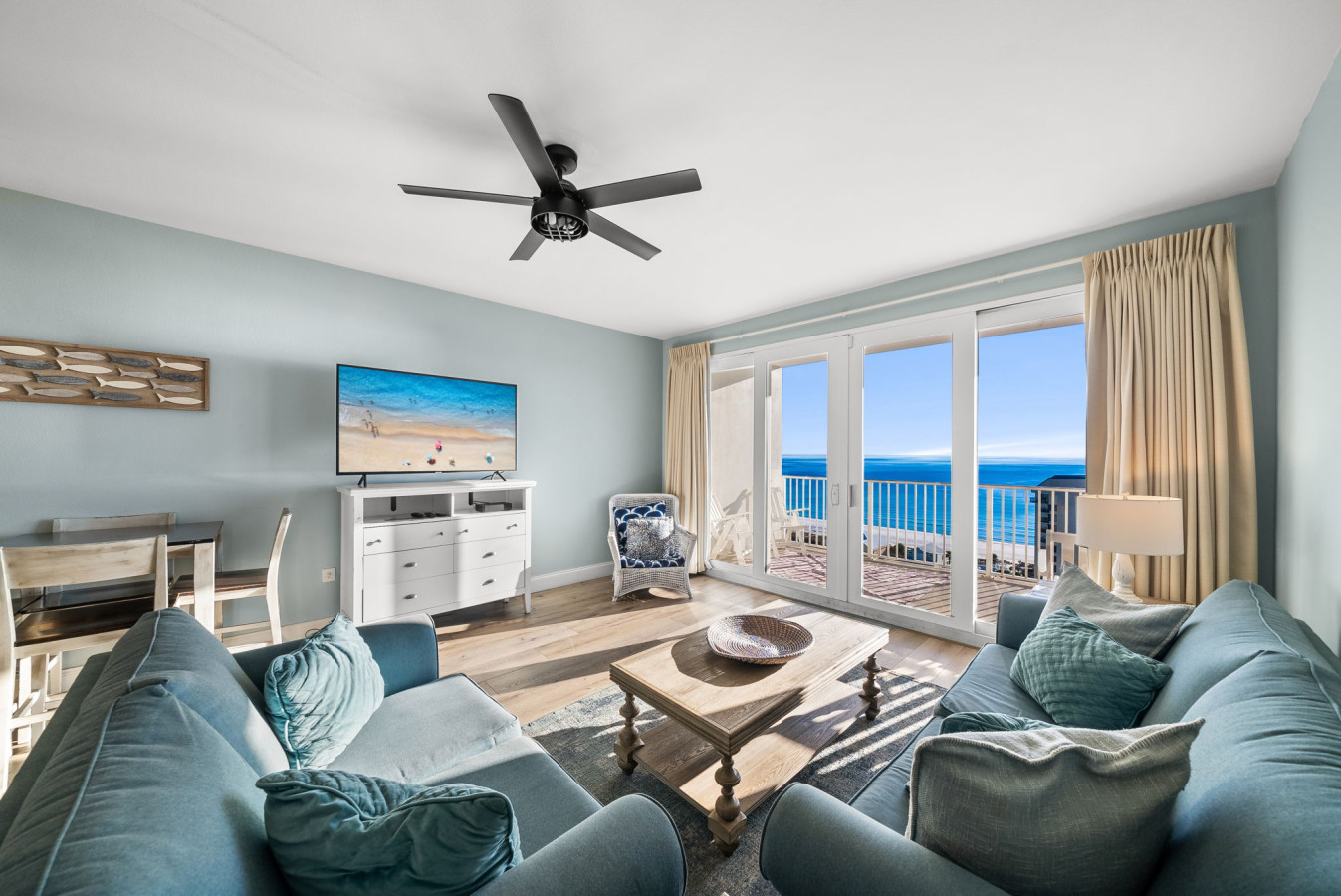 Relax in the inviting living room with stunning floor-to-ceiling Gulf views