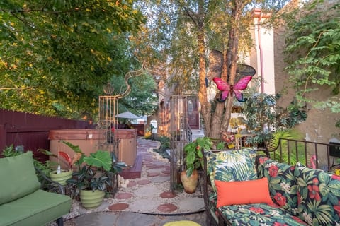 Enjoy the private hot tub with a nearby sitting area
