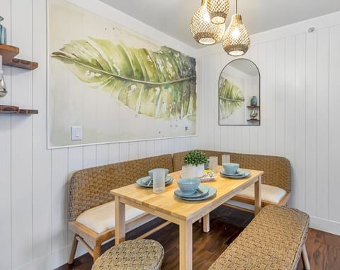 Cozy banquette dining nook for long chats and lazy vacation breakfasts.
