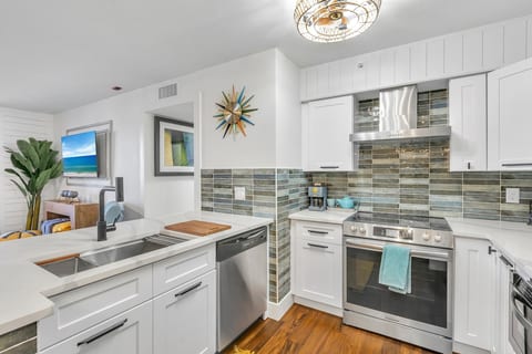 Fully stocked coastal kitchen ready for coffee, cocktails, and everything in between.