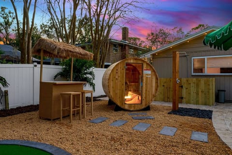 Imagine unwinding in your private backyard oasis - swim in the pool, relax in the sauna, sip cocktails at the tiki bar, and finish with a refreshing outdoor shower. Designed for total relaxation, just minutes from the beach.