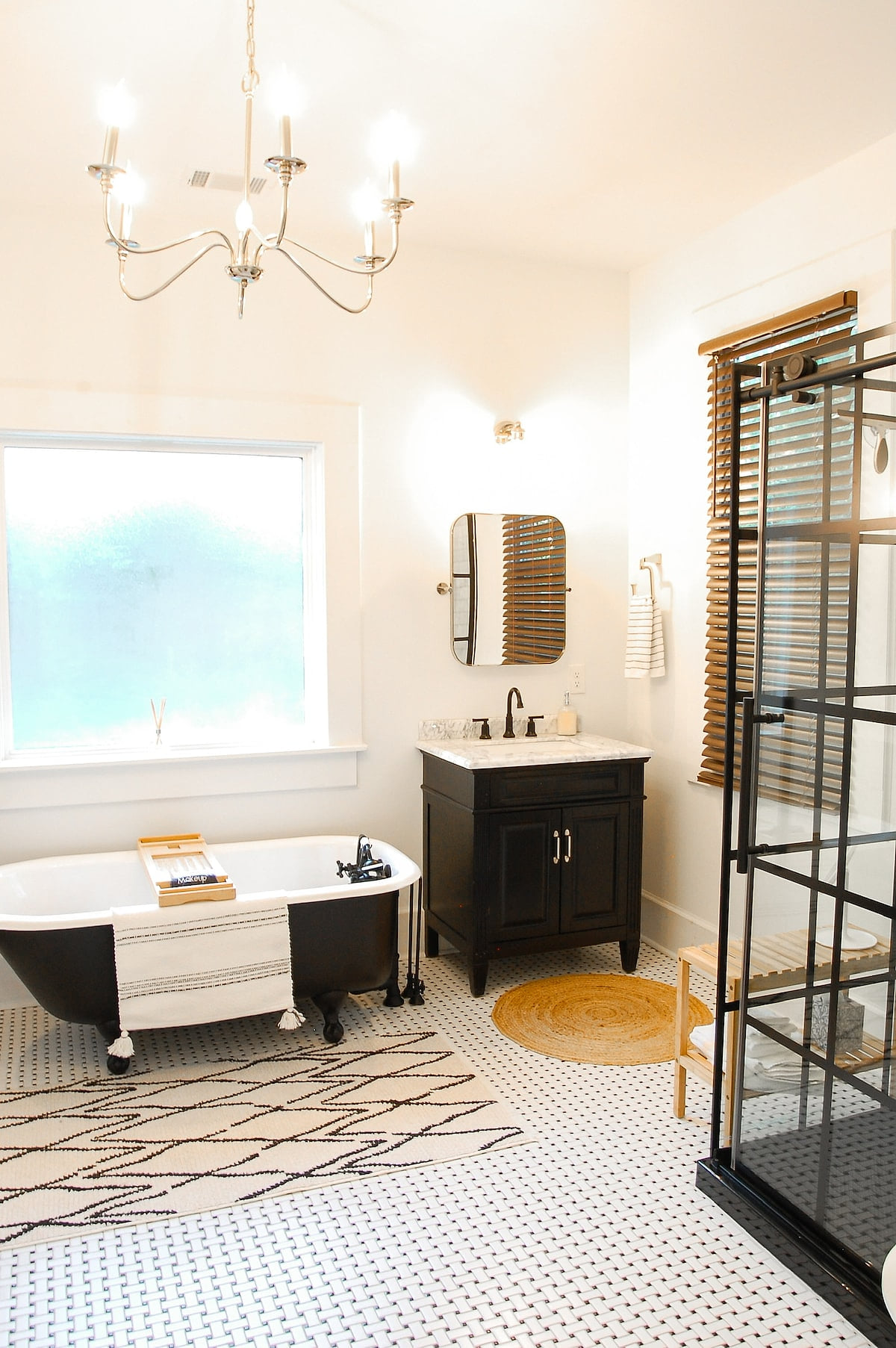 Enormous ensuite master bath includes a delightful clawfoot tub and a sleek modern shower. Two vanities for plenty of space to prep for all of the fun that you'll have in Aiken!
