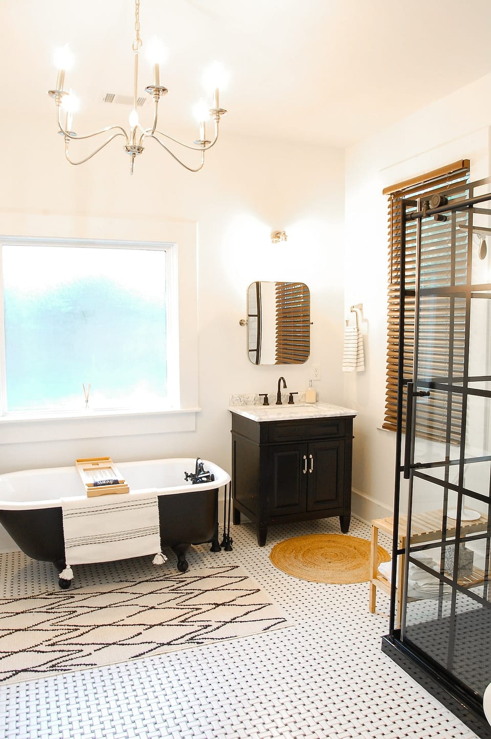 Enormous ensuite master bath includes a delightful clawfoot tub and a sleek modern shower. Two vanities for plenty of space to prep for all of the fun that you'll have in Aiken!