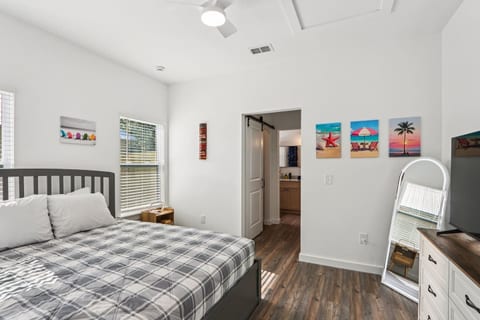 Master bedroom with King Bed, twin trundle pull-out under King Bed, Smart TV, dresser, 2x closets, pack n' play in closet, ensuite bathroom